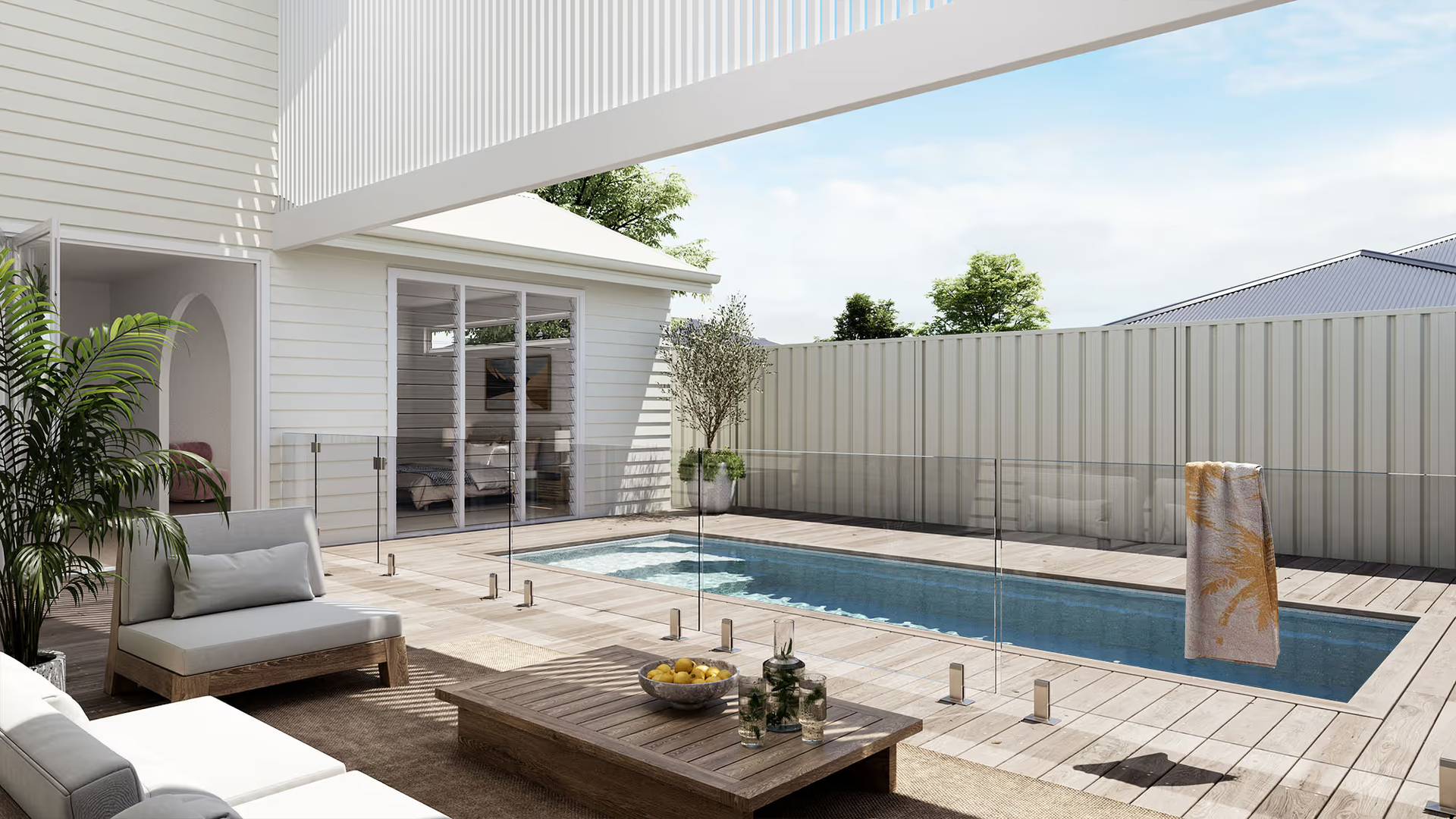 Modern Backyard Patio with Lounge Seating and A Narrow Swimming Pool — New Vision Pools in Kempsey, NSW