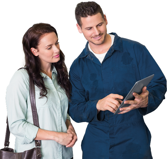 Two people reviewing a tablet together, with one pointing at the screen.