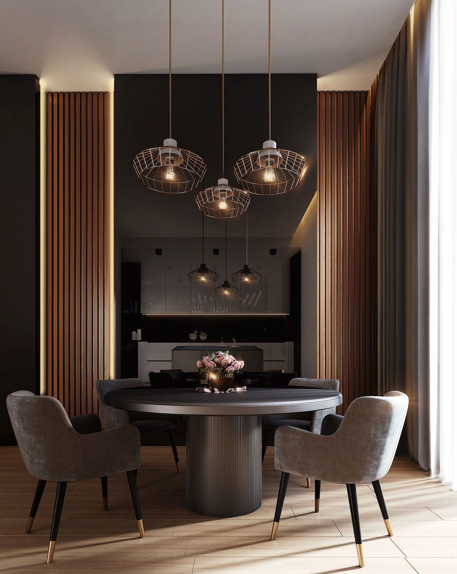 A dining room with a round table and chairs