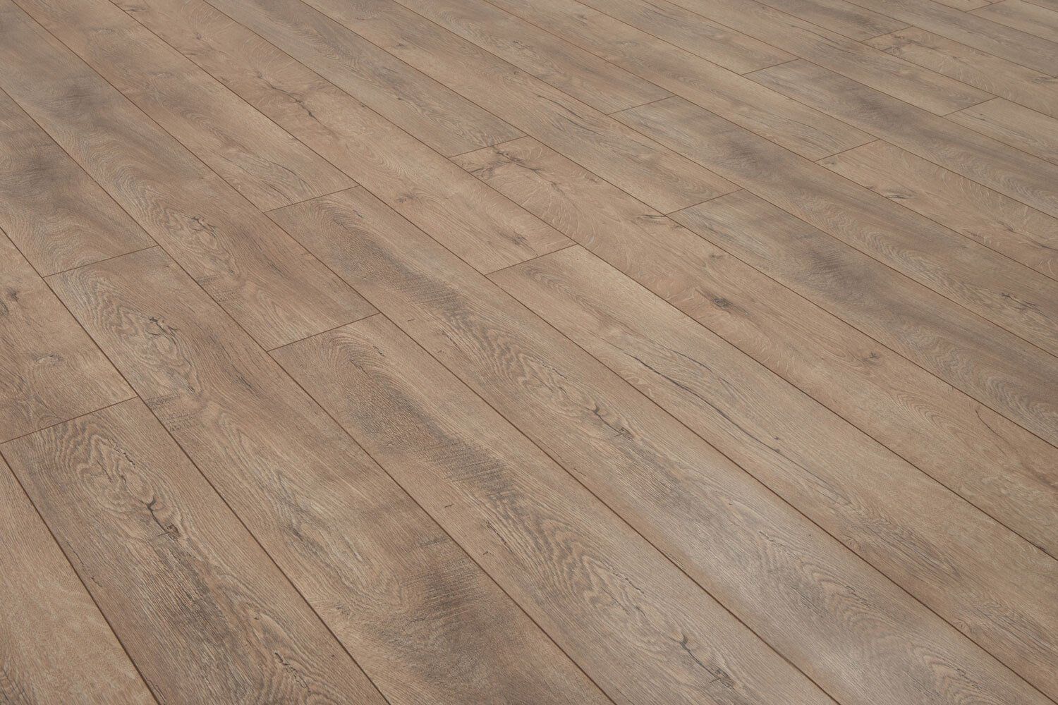 A close up of a wooden floor in a room.