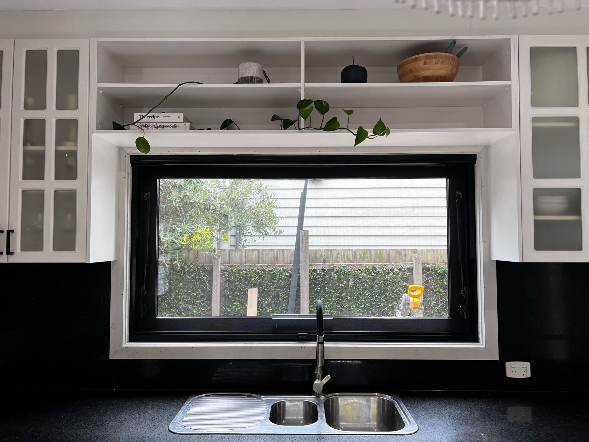 A Kitchen With a Sink and a Large Window — Strut Re-gas Mackay In Moranbah, QLD