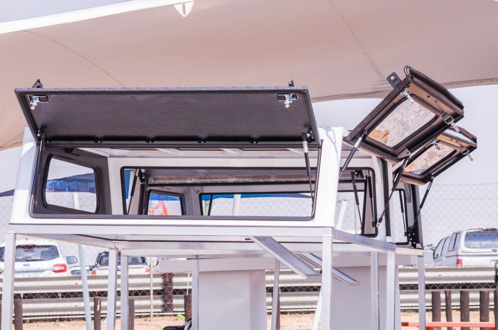 A Canopy With the Doors Open is Sitting on Top of a Table — Strut Re-gas Mackay In Ooralea, QLD
