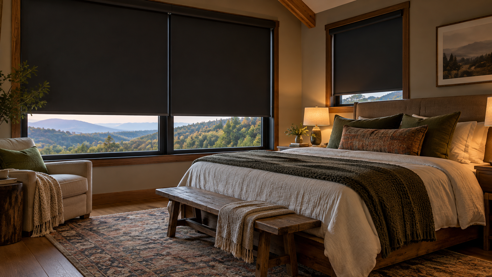Cozy bedroom with a large bed, dark window shades, and a scenic mountain view through wide windows