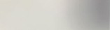 Soft gray-to-beige gradient background with no distinct objects or subjects