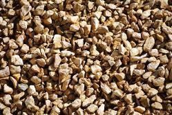 Close-up of tan and brown gravel stones filling the frame