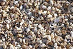 Close-up of small tan, brown, and gray gravel stones.