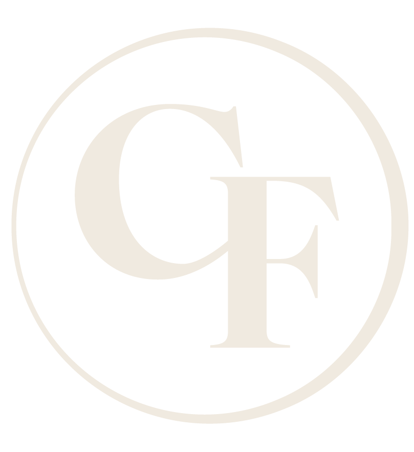 Pale gold CF monogram inside a thin circular border on a white background