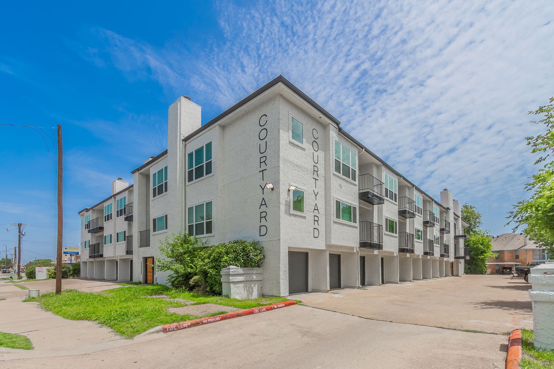 White condo building with 