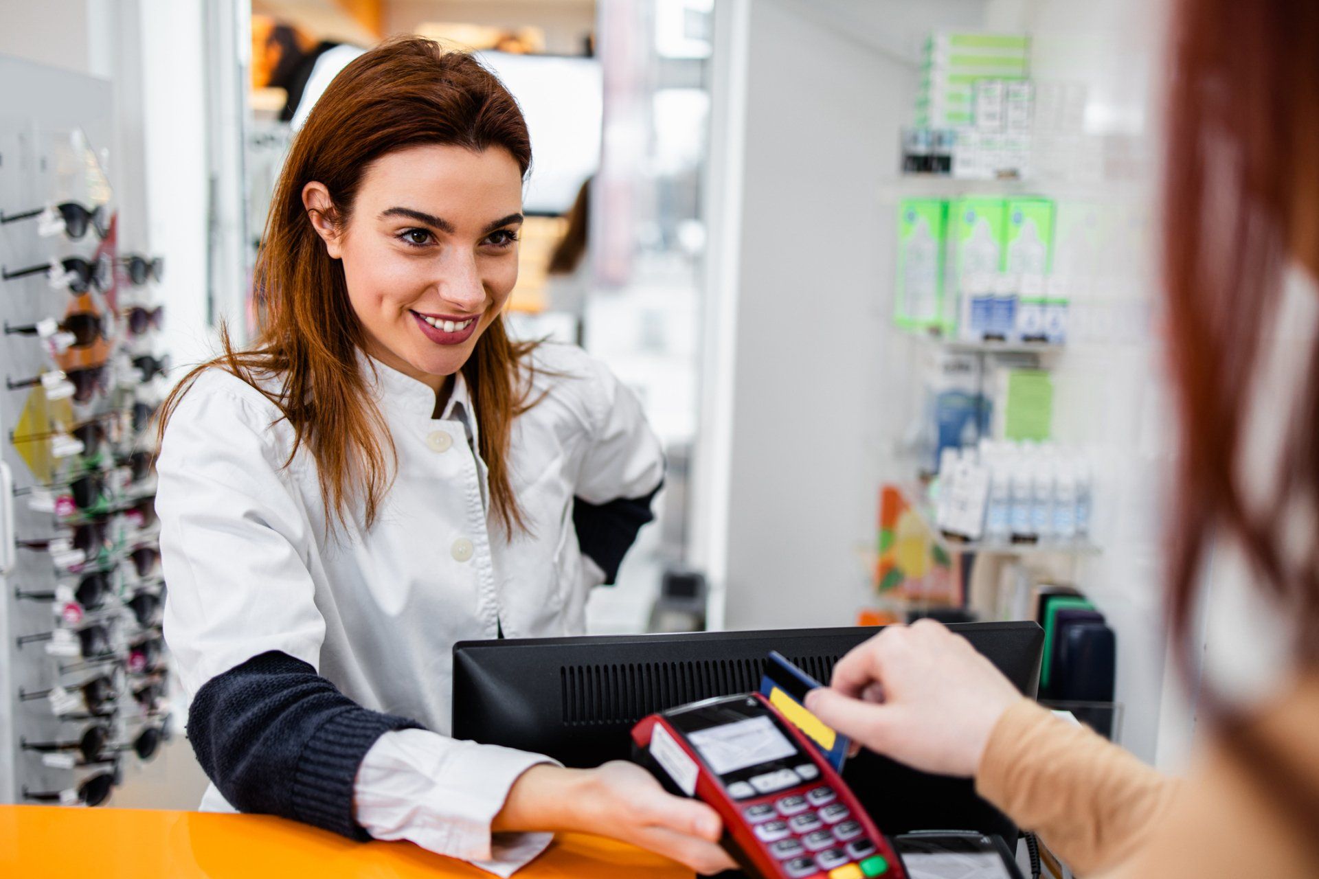 Lady Paying Her Bill — Middlesboro, KY — Mountain Optical