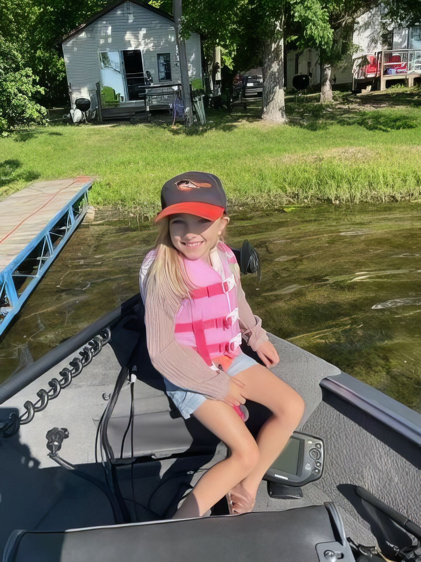 smiling girl in boat

