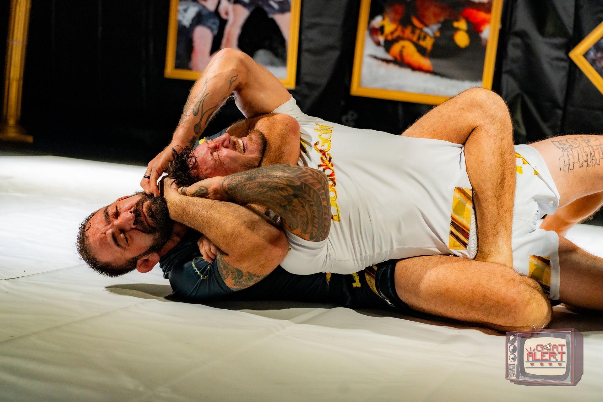Jameel Massouh attempts to secure a rear naked choke on Michael Santiago at DGI 3.
