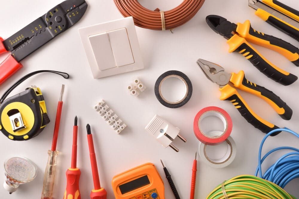 A Bunch Of Electrical Tools Are Laying On A Table — Allpower Electrical Wholesalers Pty Ltd In Atherton, QLD