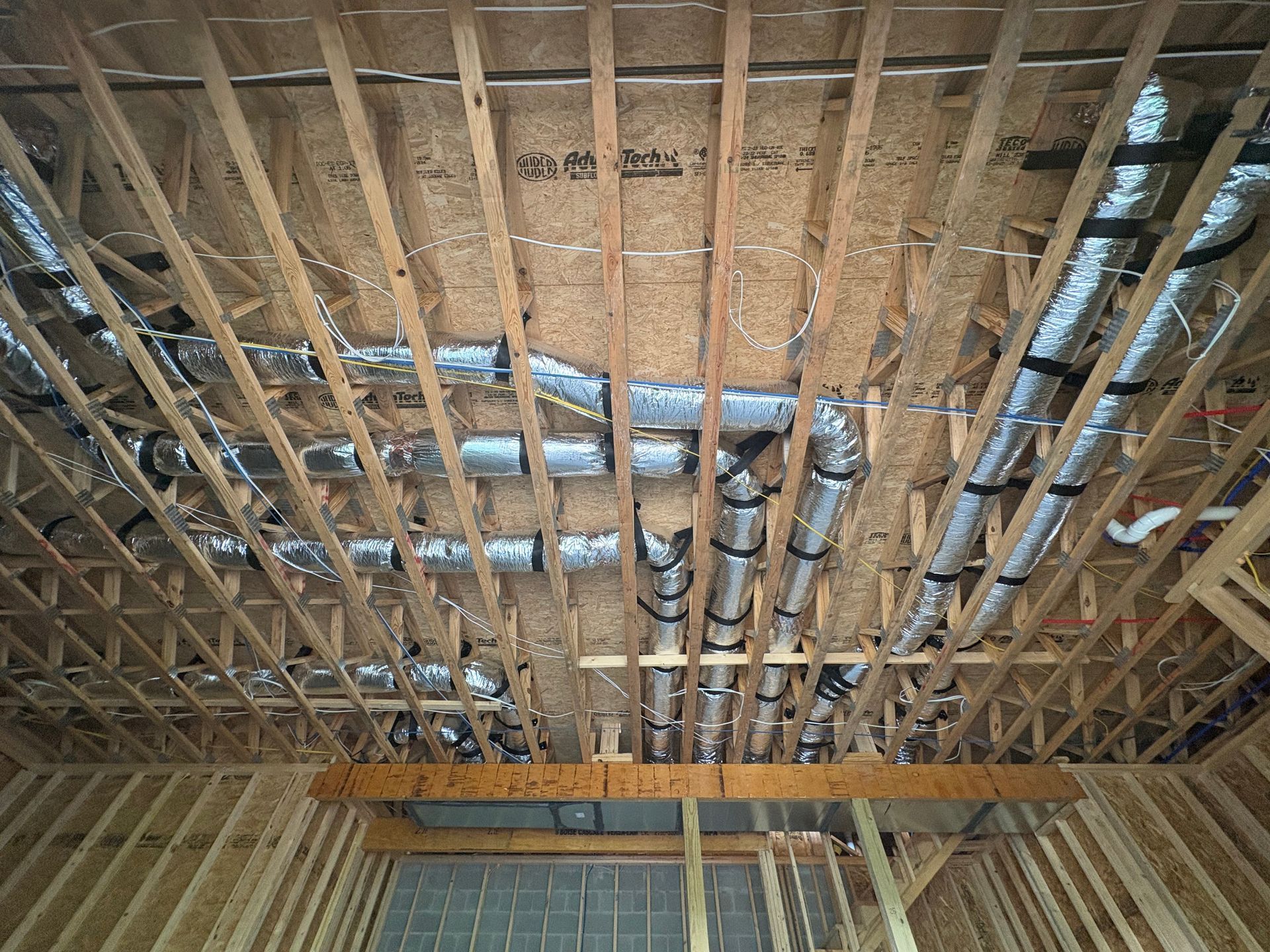 Ductwork in a ceiling trusses