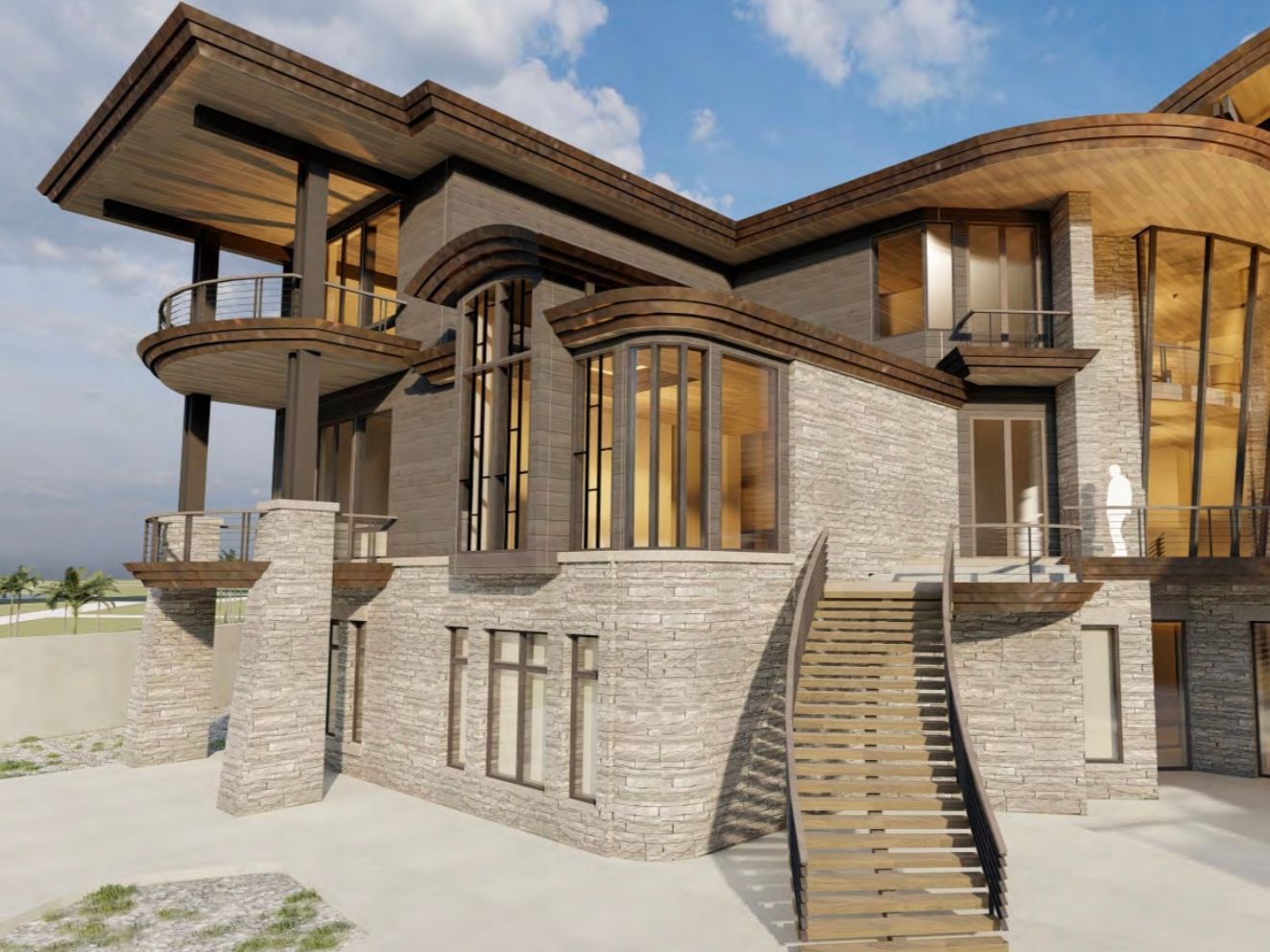 Modern two-story stone house with curved balconies, large windows, and exterior stairs under a blue sky