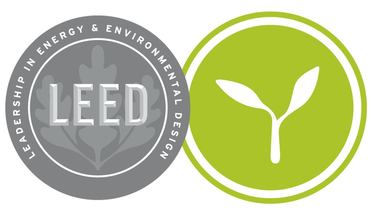 LEED certification logos: gray seal and green circle with white sprout icon