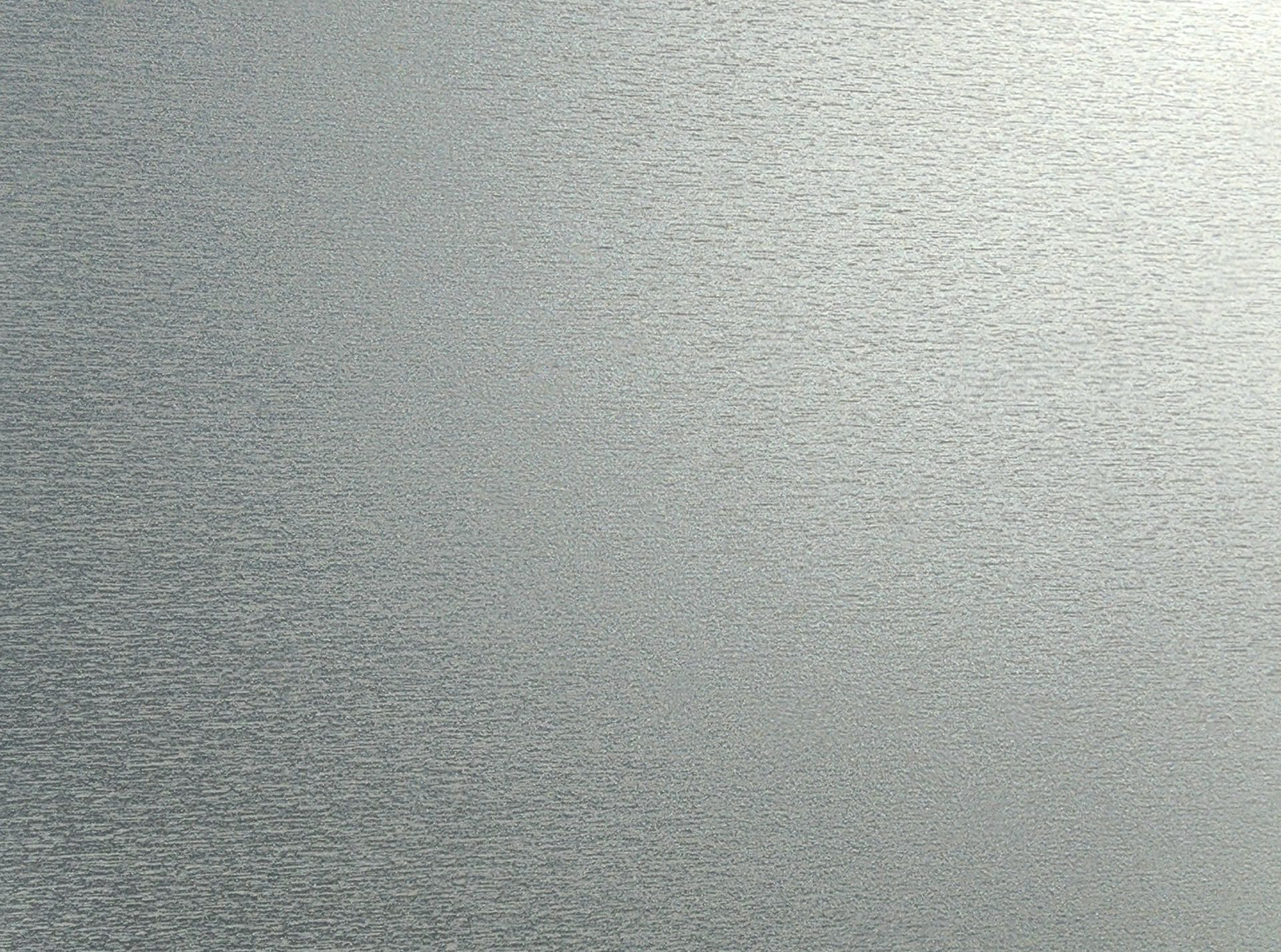 Plain gray textured surface with a subtle speckled pattern