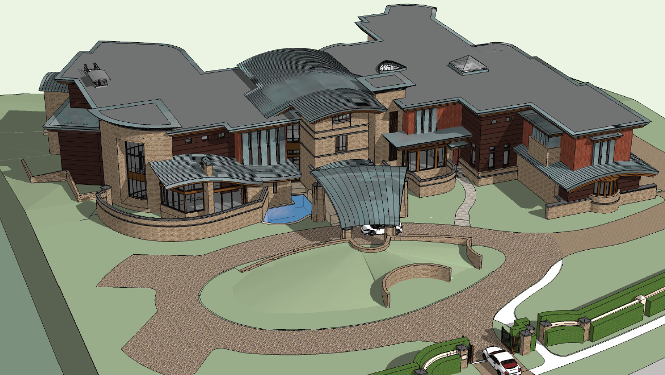 Aerial view of a large modern house with multiple wings, gray roofs, and a curved stone driveway.