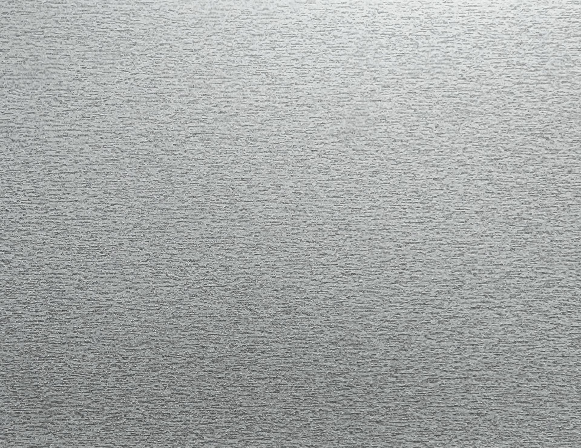 Close-up of a gray, textured fabric surface