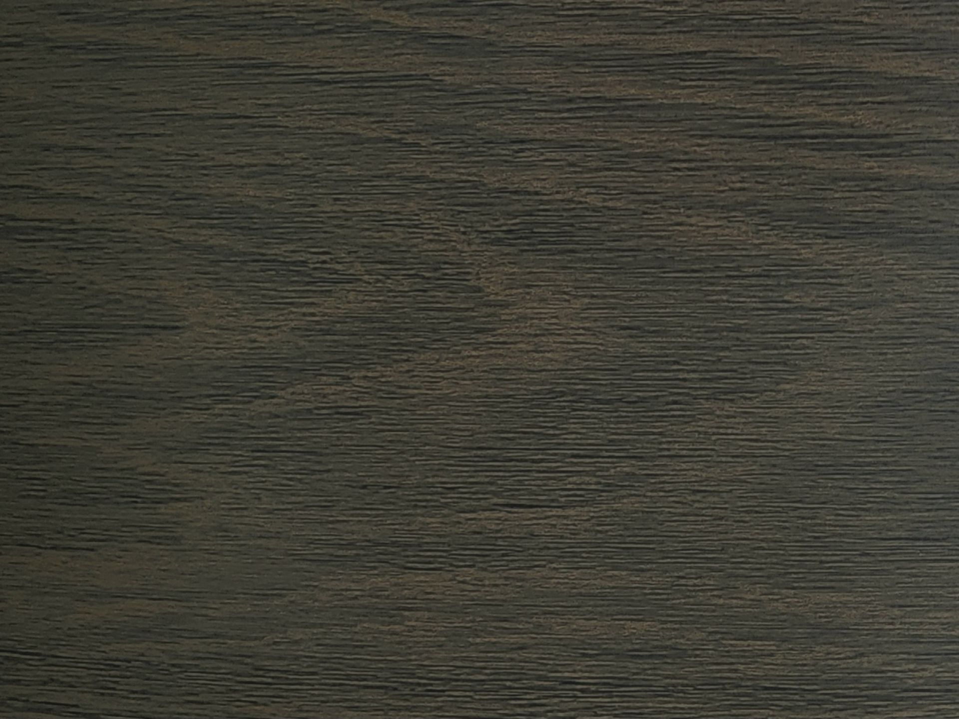 Dark, textured brown surface with horizontal grain-like lines
