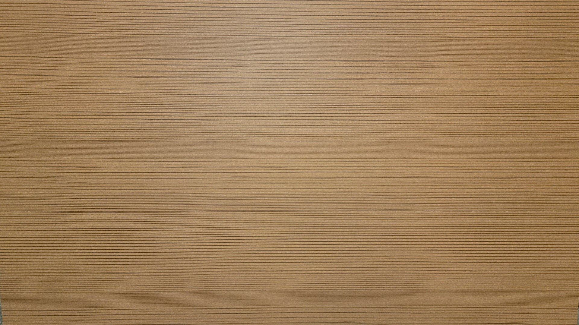 Light brown wood-grain surface with horizontal texture and knots