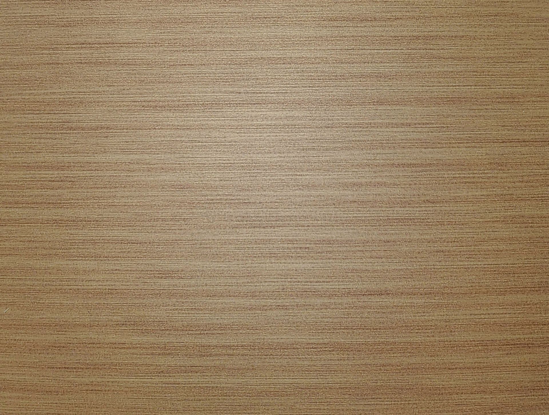 Light brown wood grain texture filling the frame.