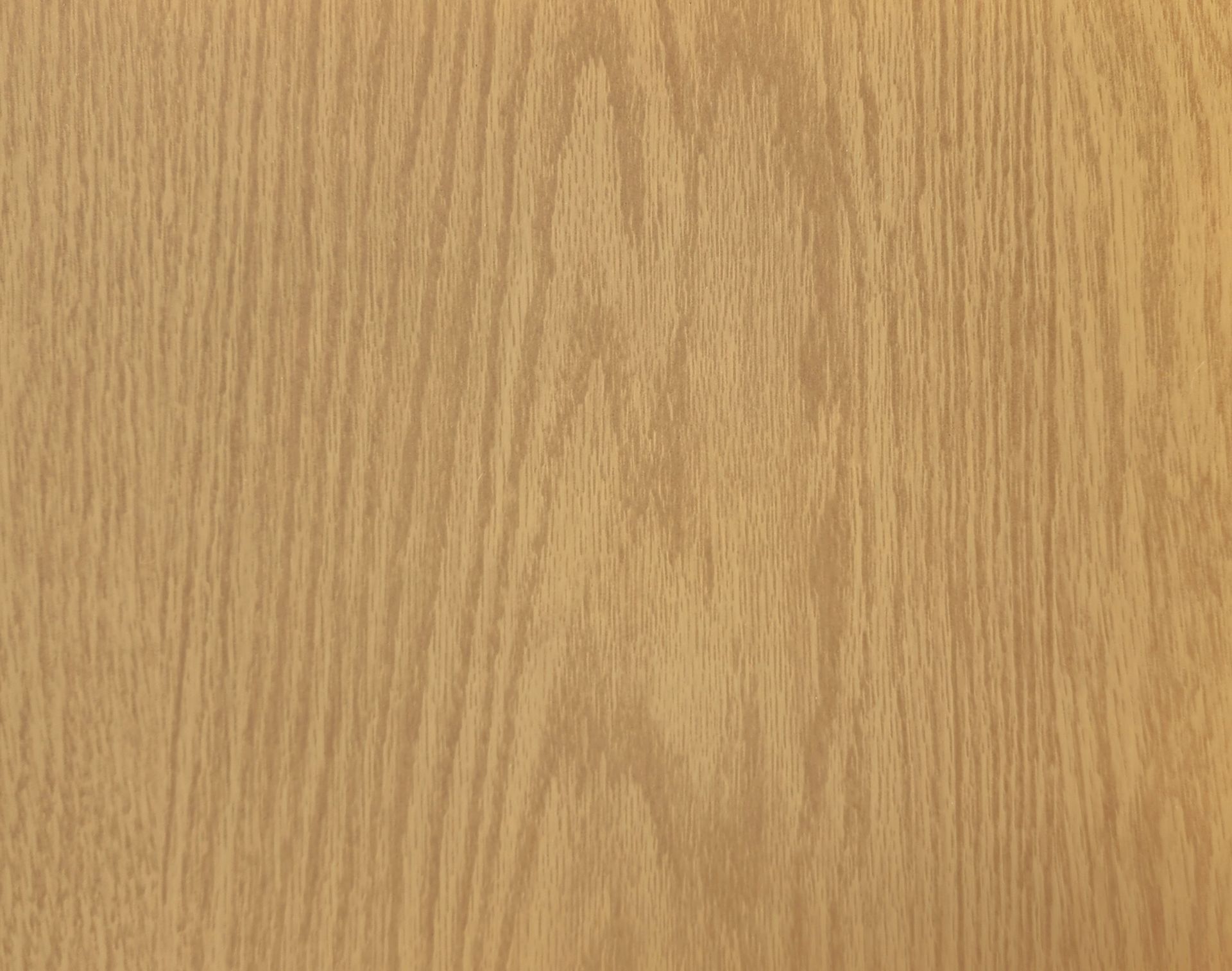 Light wood grain surface in a tan-brown color.