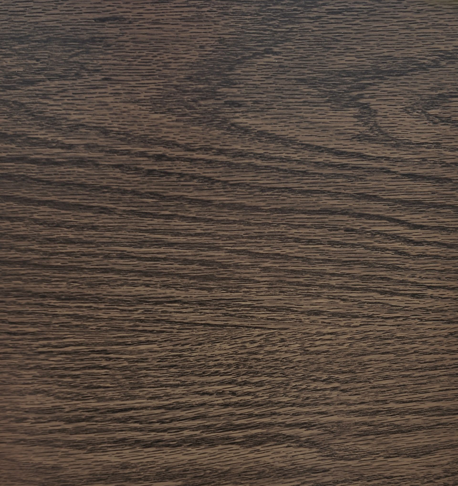 Close-up of rippling dark brown water with small waves and textured reflections