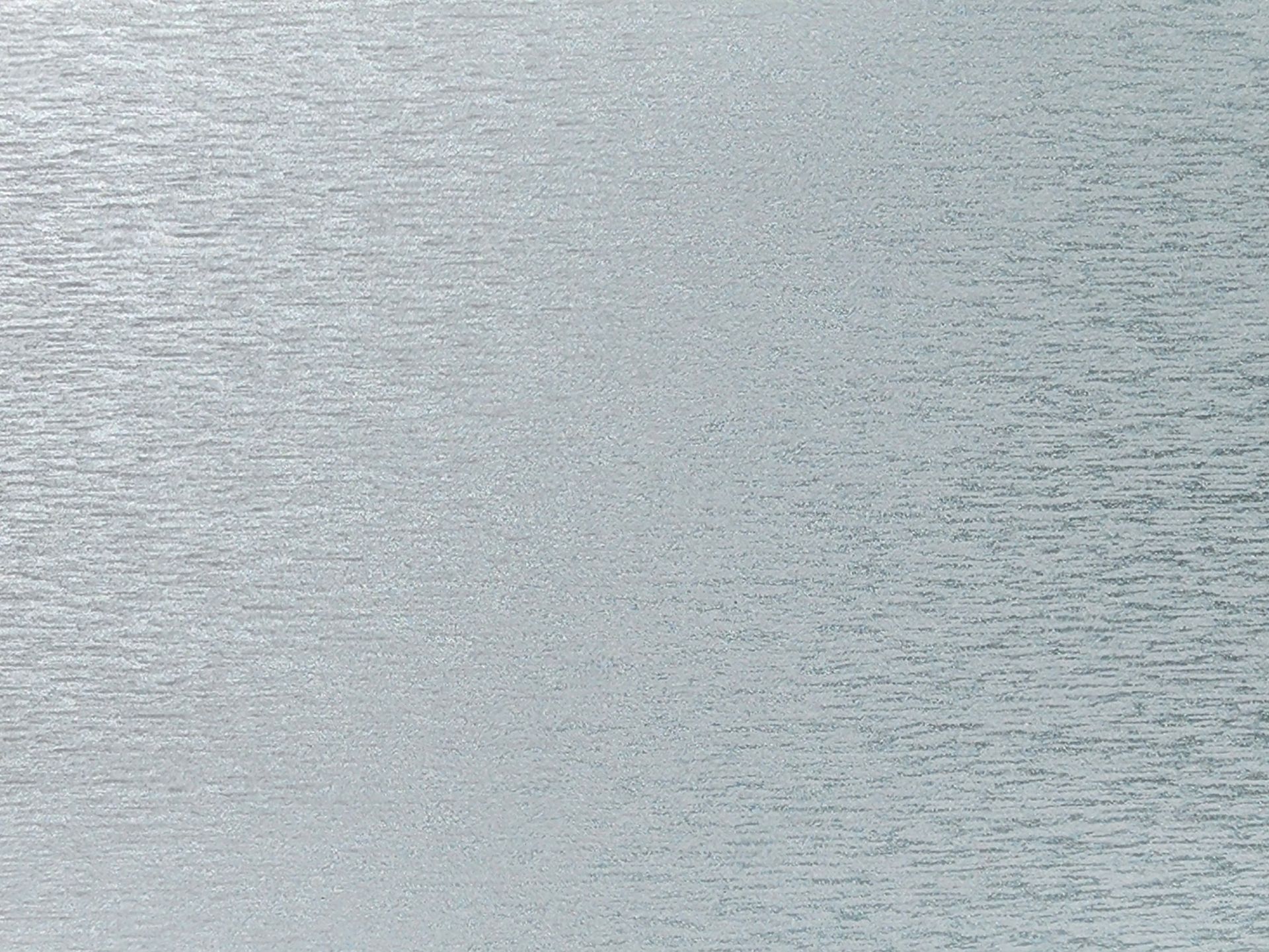 Calm rippling gray water filling the frame