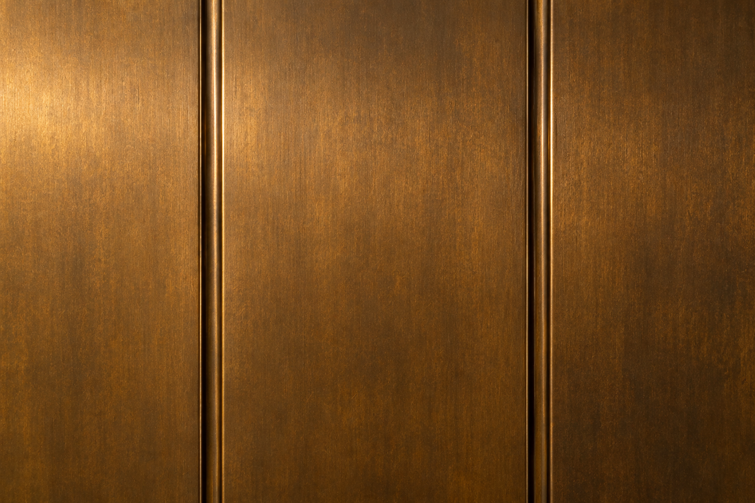 Close-up of vertical wooden panels with warm brown tones and narrow grooves