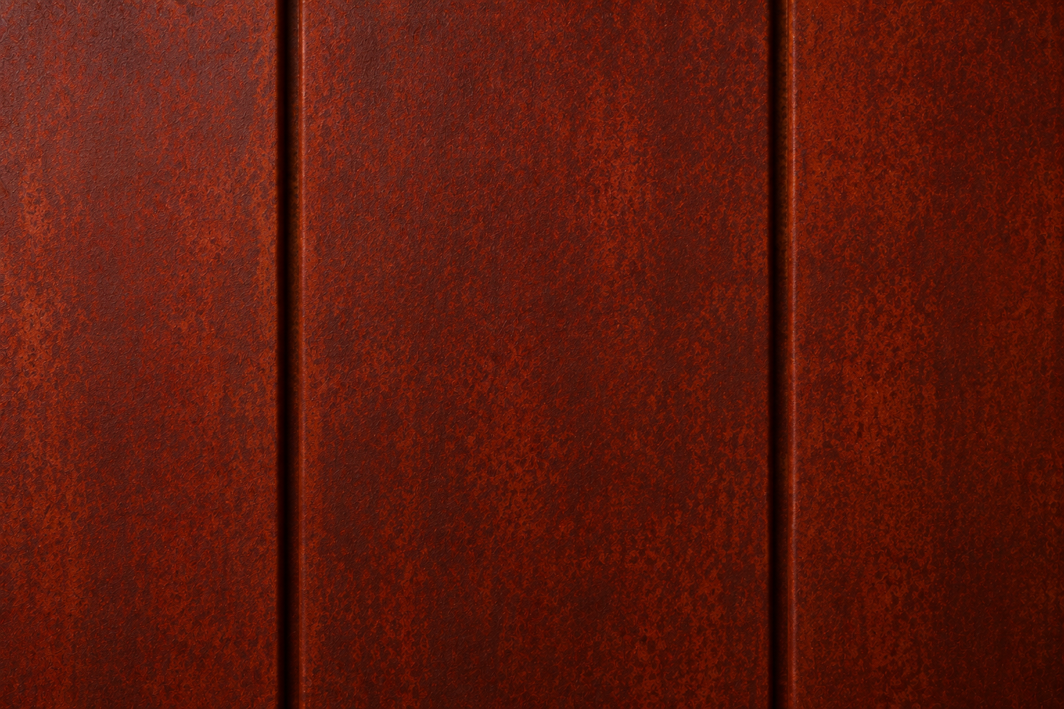 Dark red wooden panels with vertical seams and a textured surface
