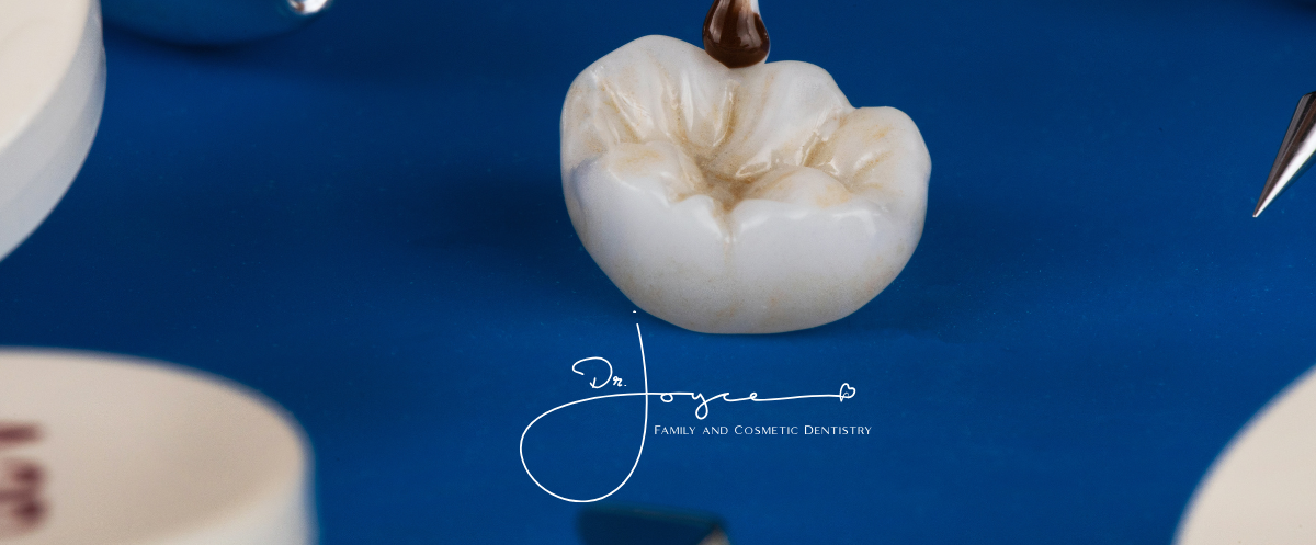A close up of a tooth on a blue surface.