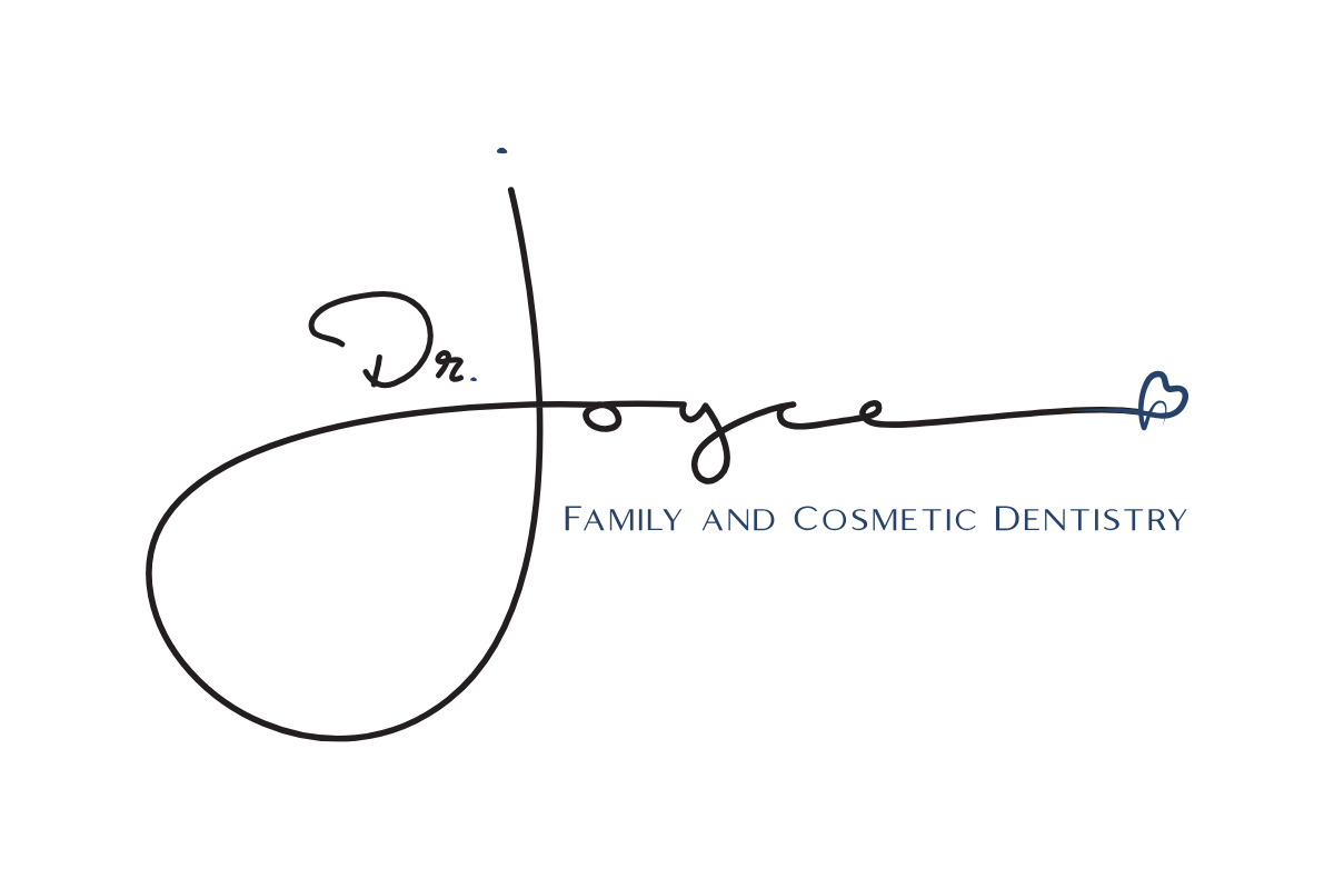 A handwritten signature for dr joyce family and cosmetic dentistry