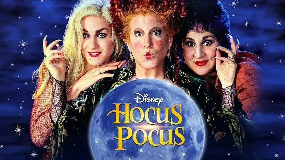 Hocus Pocus movie poster featuring three witches around the Disney logo in a dark, magical style