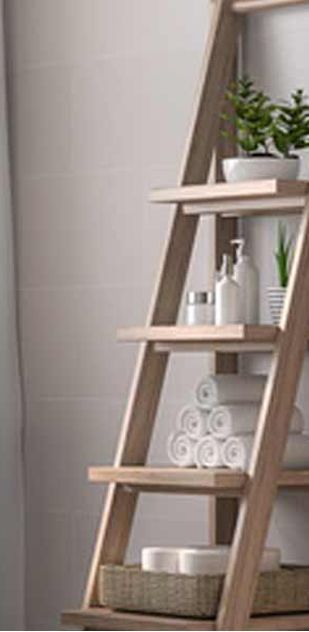 A wooden ladder filled with towels, bottles, and baskets.