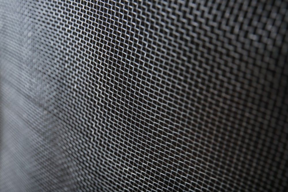 It is a Close Up of a Metal Mesh — Whitsunday Screens & Grilles In Cannonvale, QLD