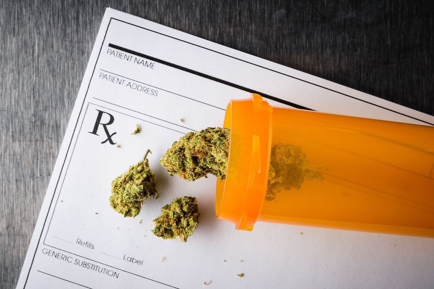 Marijuana bud on an Rx prescription pad