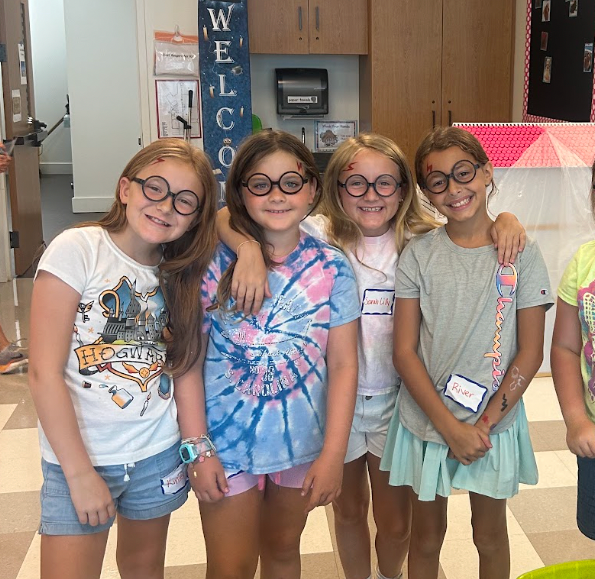 Kids building with LEGO and STEM materials