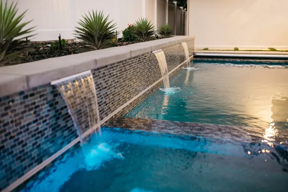 modern pool with sheer water features. modern pool with sheer water features.