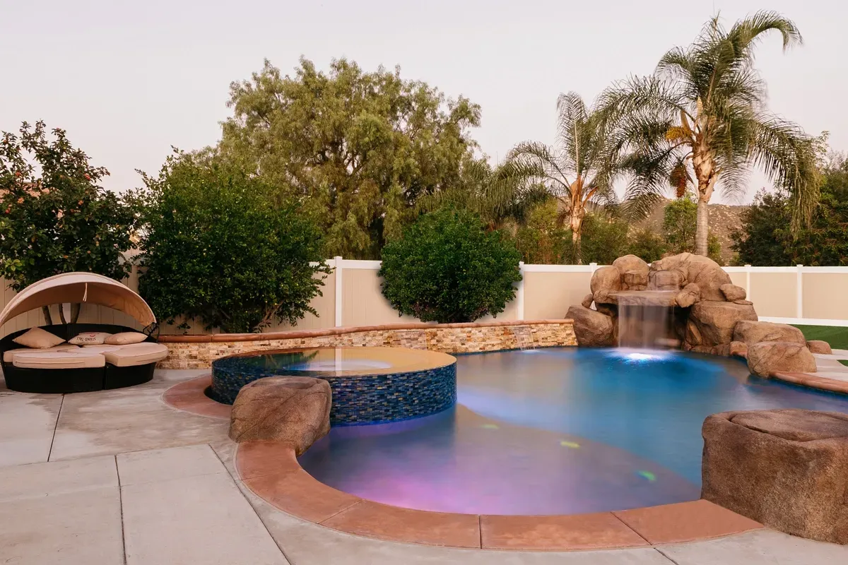 rock and waterfall pool design and build project located in Orange County, CA by Refined Pools. rock and waterfall pool design and build project located in Orange County, CA by Refined Pools.