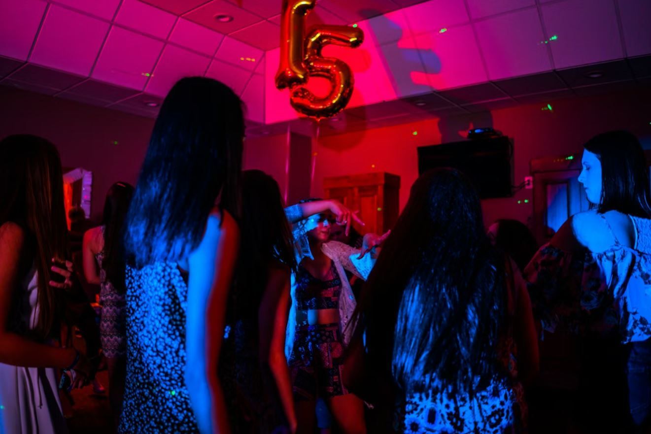 fifteenth birthday party with dancing and colorful lights in Edinburg, TX