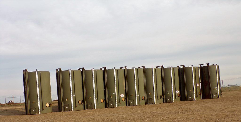 row of oil barrels