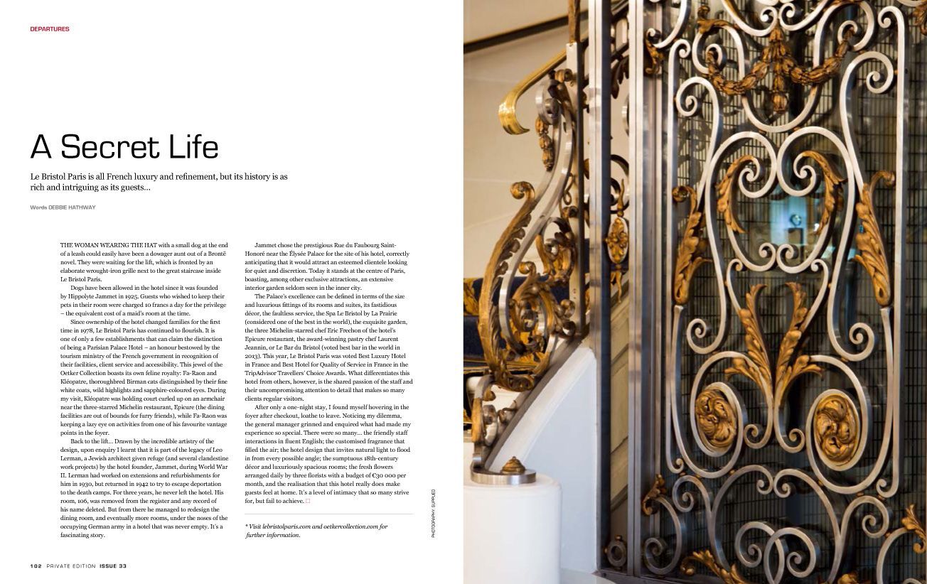 Magazine spread with article titled “A Secret Life” beside an ornate black-and-gold gate in a white interior
