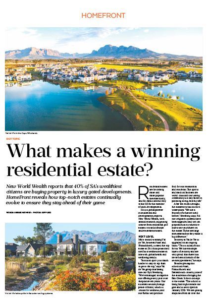 Magazine article page with aerial waterfront homes and headline, “What makes a winning residential estate?”