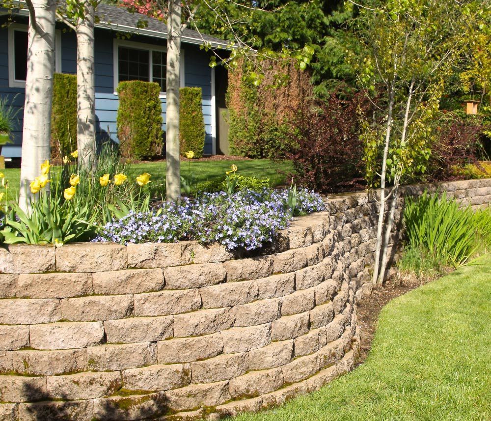 Retaining Wall in Landscaped Yard — Yonkers, NY — Jerry's Contracting Corp. Retaining Wall in Landscaped Yard — Yonkers, NY — Jerry's Contracting Corp.
