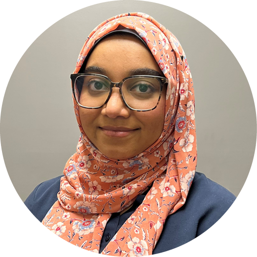 A woman wearing a scarf and glasses is in a circle.