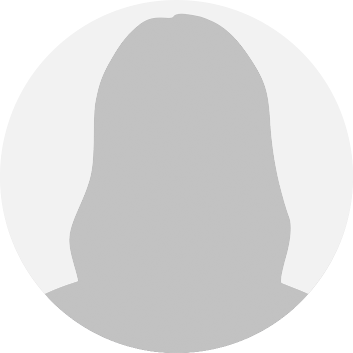 A woman with long hair is smiling in a circle.