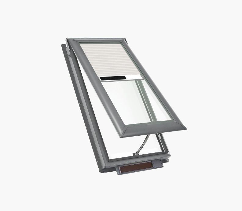 Open skylight with white blinds and gray frame.
