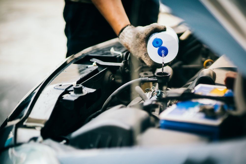 Pouring Water on Car Engine