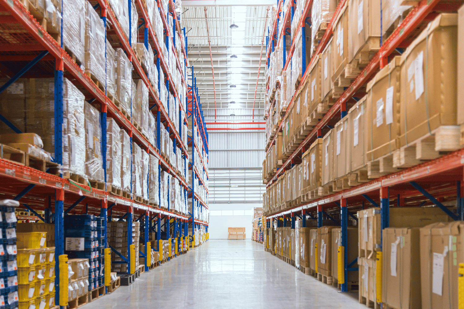 A large warehouse filled with lots of boxes and shelves.
