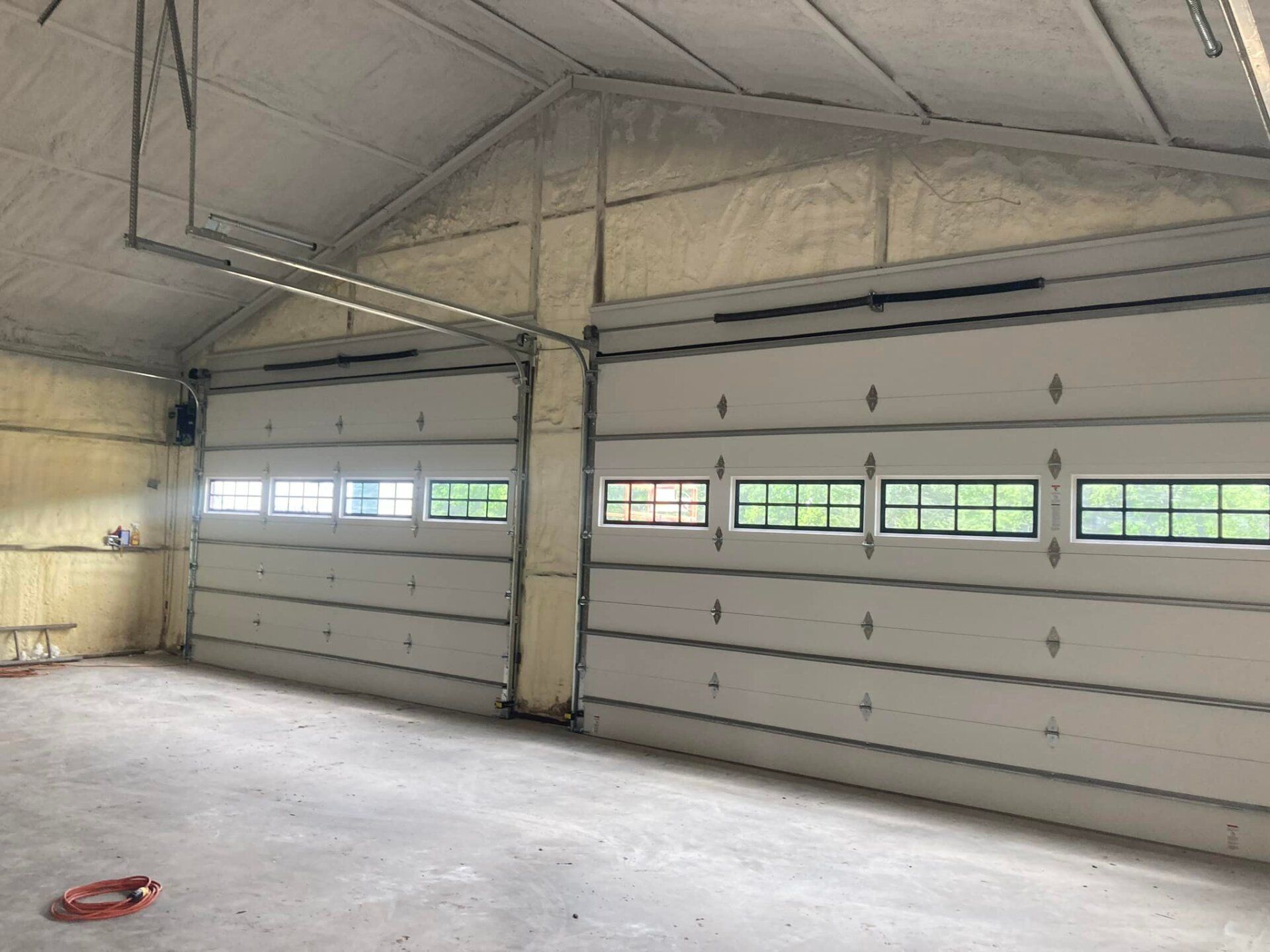Two Garage Doors — Denison, TX — North Central Door and Gate